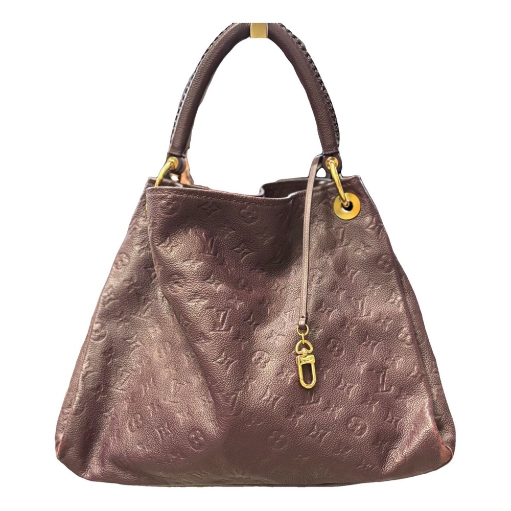 Elegant purple Louis Vuitton Artsy Handbag